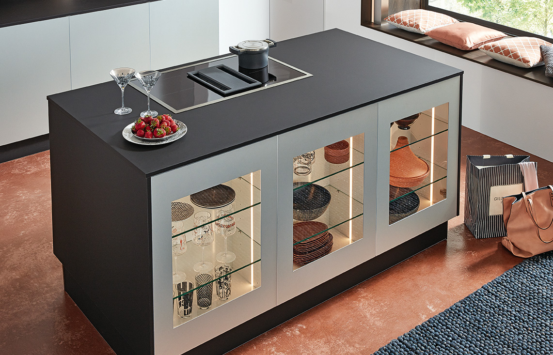 German kitchen island with integrated storage and display cabinetry
